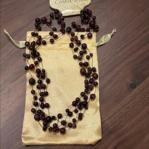 Exotic 5-strand wooden bead necklace from Costa Rica, with gold drawstring bag